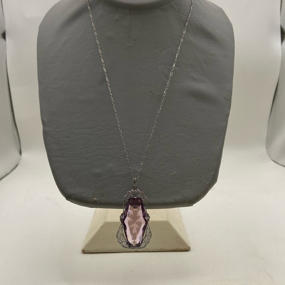 this is a is an antique costume piece being sold as its value as an antique. - Picture 2 of 7